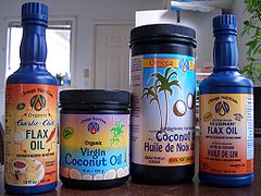 Flax seed oil (in bottles) and coconut oil (in jars in the middle).